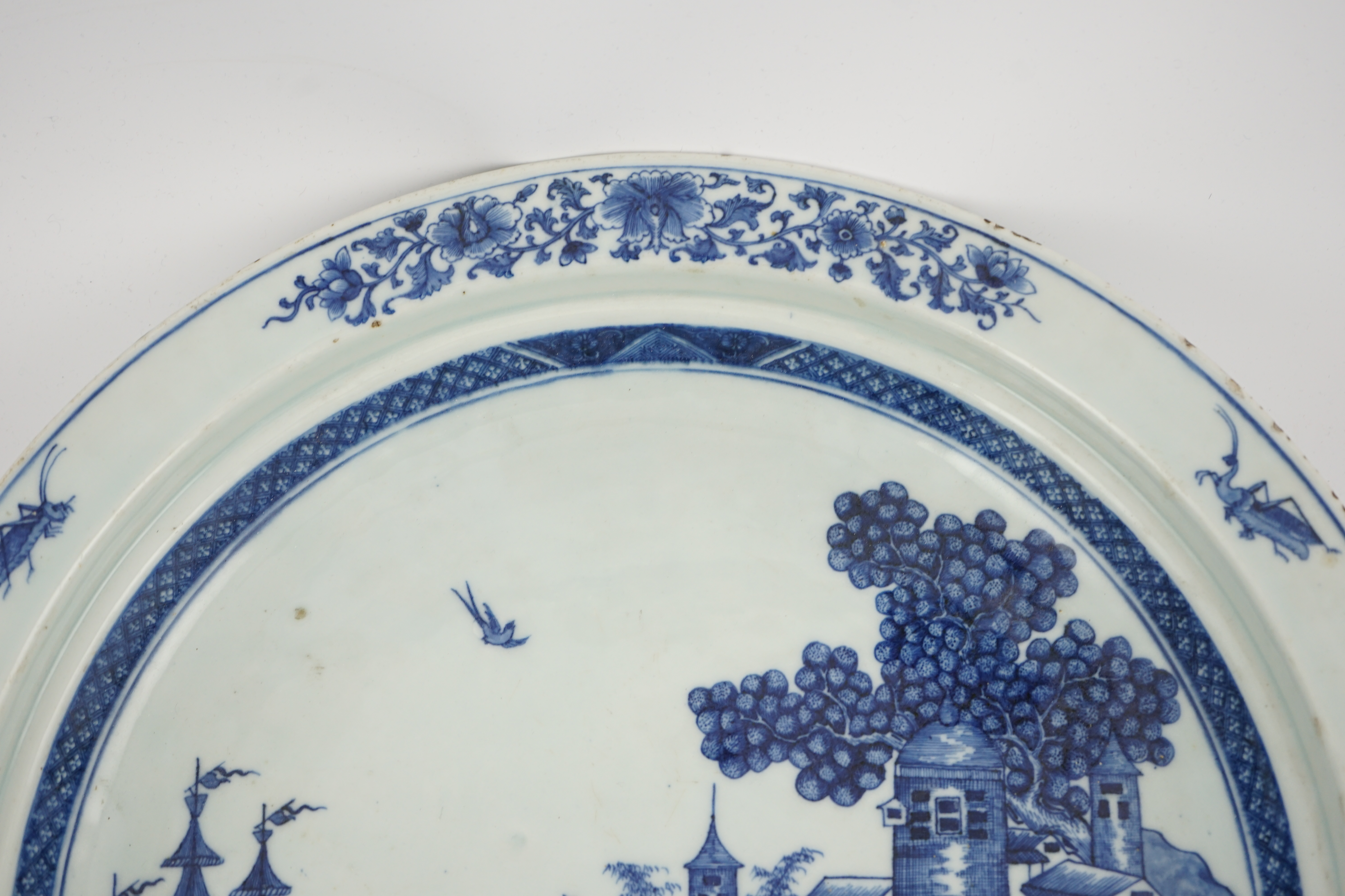 An unusual Chinese European subject blue and white shallow basin, Qianlong period